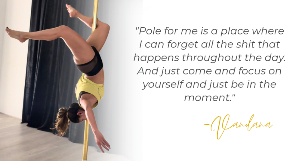 Student hanging upside down by one leg during a pole class, a popular form of pole dancing for stress relief